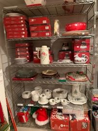 An entire section of holiday decor including this extensive Pfaltzgraff  Holiday dishware ensemble