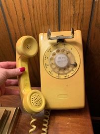 Yep.  It's a vintage Bell rotary dial wall phone!