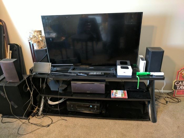 A lot of good electronics, with multiple TVs and sound systems, a Wii, and various other items.