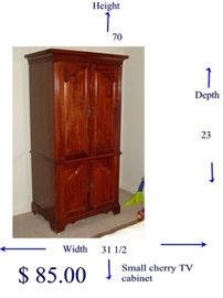 a small cherry tv cabinet