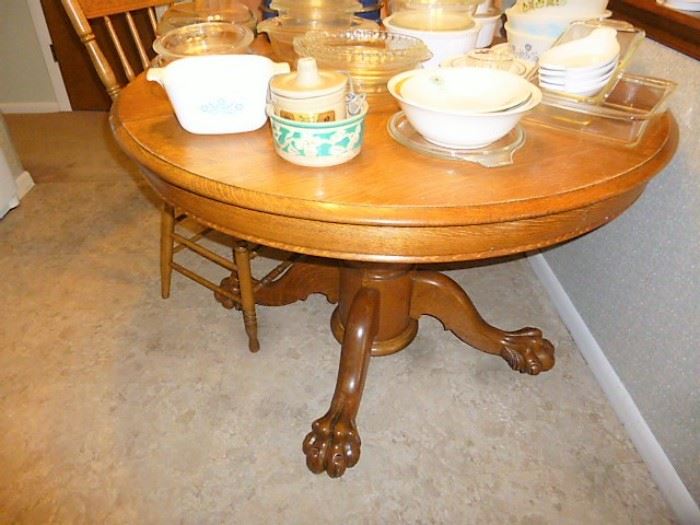 Vintage claw foot oak kitchen table & two CLEAN chairs. $175 For the set!