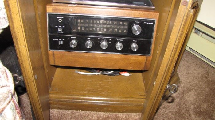 Magnavox Drum Console. Tuner - record player and speakers all rolled into one side table cabinet.