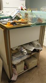 Rolling craft / sewing table with drop leaves.