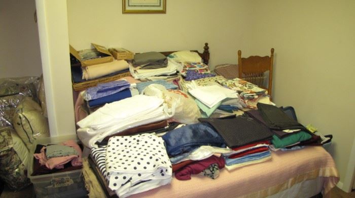 This room is FULL FULL FULL of vintage and new - fabric. Bolts & remnants - tons of sewing material !