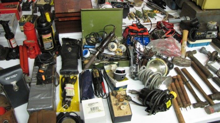 Table full of electrical test equipment.