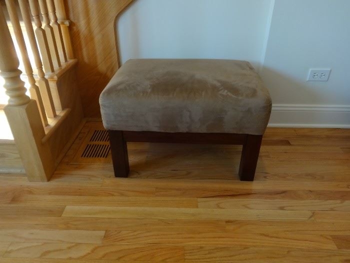 Suede-like upholstered ottoman. 2' 3" long x 1'9" wide x 1'4" tall. Good condition