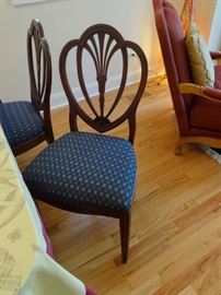 Vintage dining room chairs, set of 4, one has a missing wood piece. Size:  1'8" wide x 1'7" deep x 1'7" high at the seat. Upholstery is in good shape.