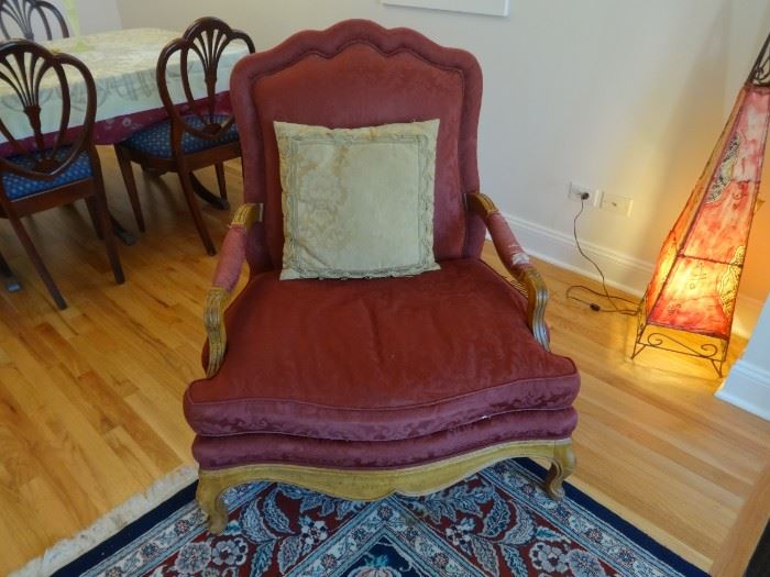 Baker Furniture Co. Upholstered wing chair. Extremely comfortable. Needs to be re-upholstered.  Size is 3'4" tall at the back x 3' wide x 2'5" deep. Purchased from Marshall Field's back in the day.