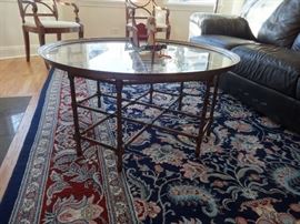 Oriental rug, very good condition needs cleaning. Size: 8'10" x 12'9" including fringe. I think it is silk. No pad.