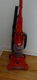 Dirt Devil bag-less upright vacuum cleaner, works well.