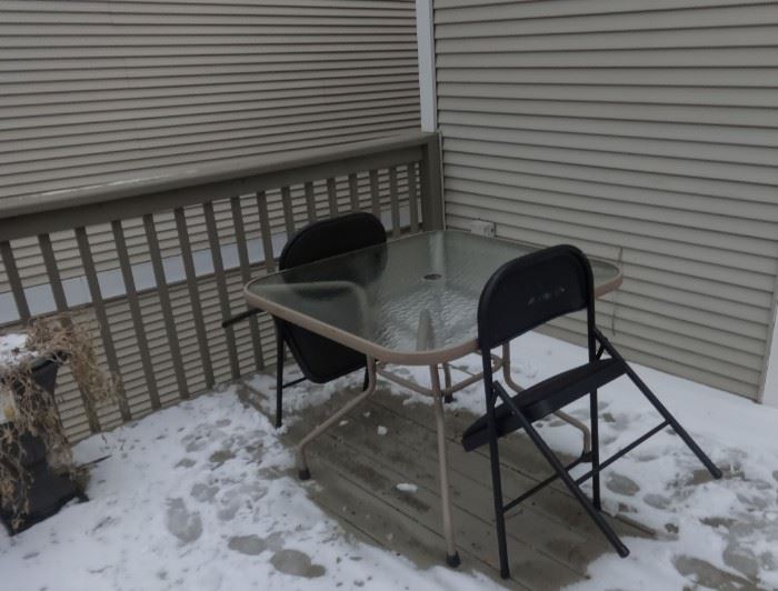 Glass top Metal Outdoor Table w/hole for umbrella & 2 chairs.