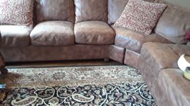 Another large sectional sofa in the media room