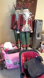 Lifesize metal nutcrackers. One of two cars and child seats. Also wood crib and portacrib.