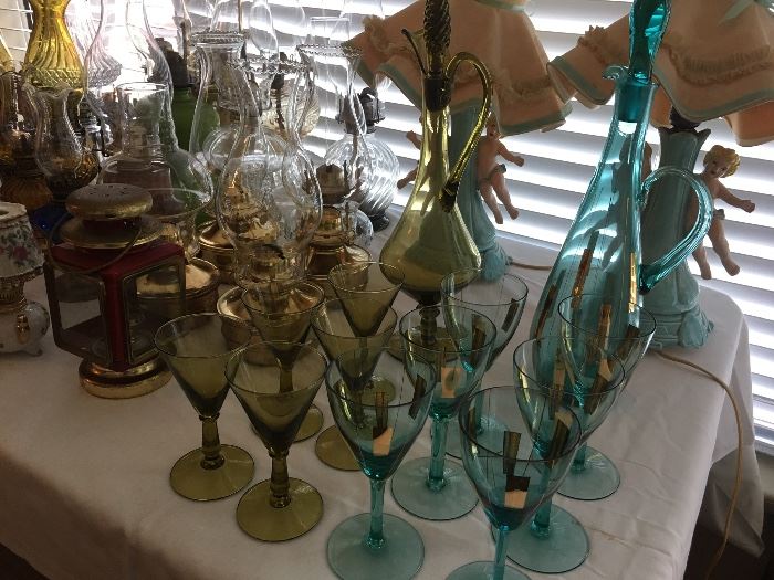 2 unique fancy glass pitchers & stemware sets.