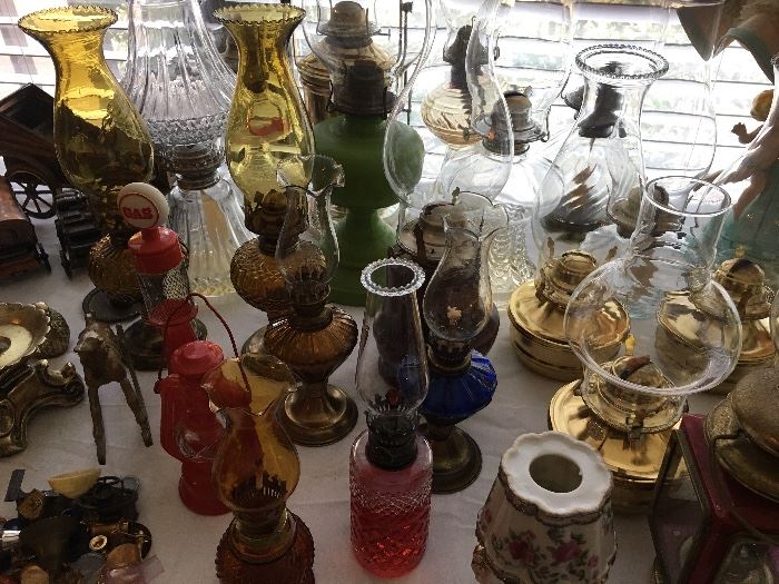 Large collection of oil lamps