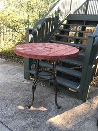 #106 metal base wood top tall patio table $40.00
