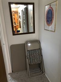 Wall art and one of several mirrors. Folding table and chair set!
