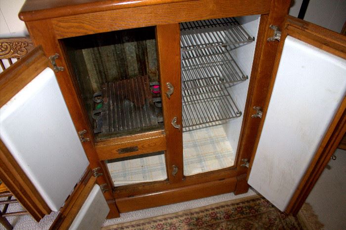 Inside of antique Gibson oak icebox