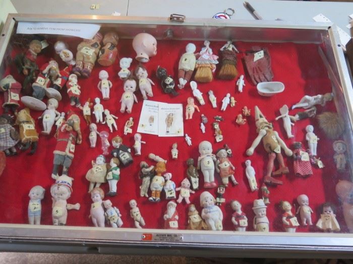 showcase of dolls