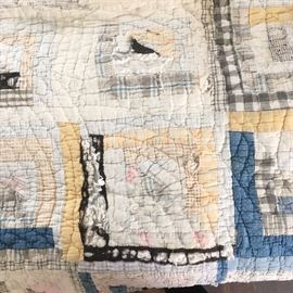 Hand quilted quilt, has fabric issues