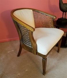 Pair of extra nice club chairs.  Solid wood with  caned sides, cushioned seats and backs; neutral cream colored fabric with tiny print.  No damage to caning, great condition.
