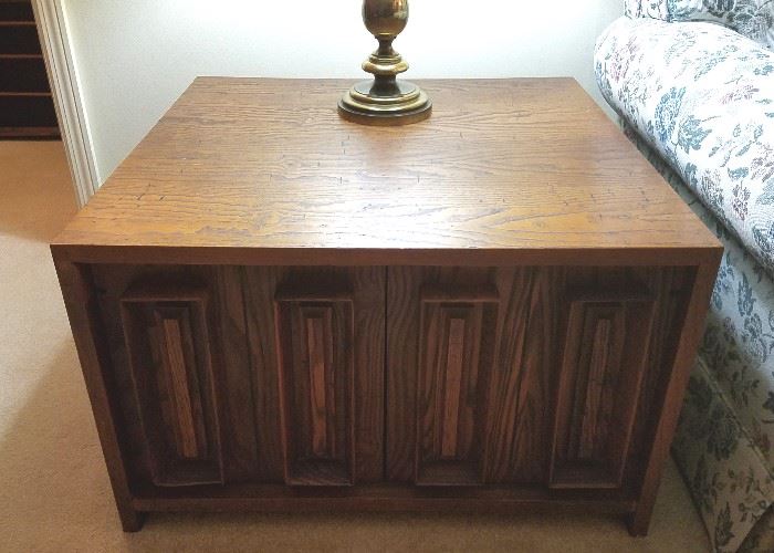 Large mid century end table.  Solid wood (dark oak) wity large storage behind double doors.  31" wide, 30" deep, 19.5" tall