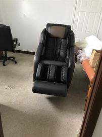 Brown leather chair with different massage strokes brand new for all body comfort with heat. $1,800.00