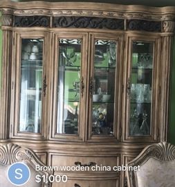 Gorgeous wooden china cabinet can be split into two parts spacious with lot of glass rack$450:00