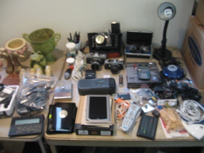 Dental Instruments, Old Camera's, Desk Lamp, TI Calculator, Wireless Microphone.