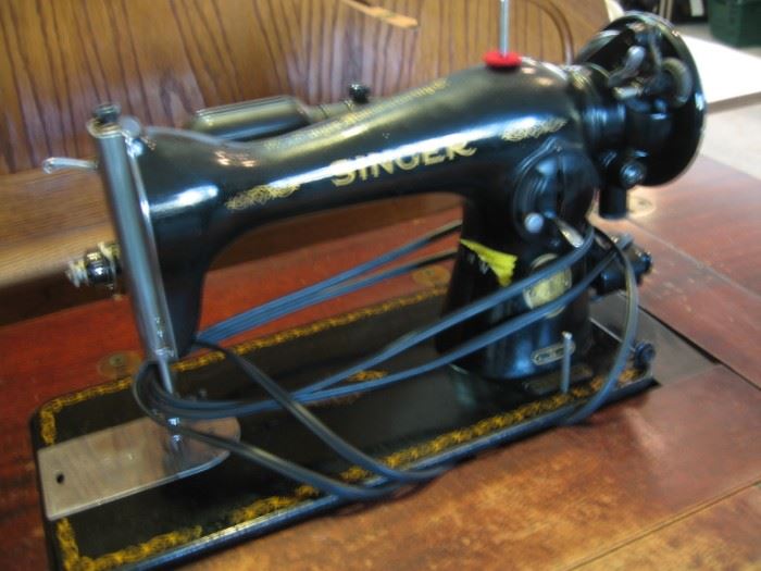 Singer sewing machine Model 10 with nice stand and foot pedal.
