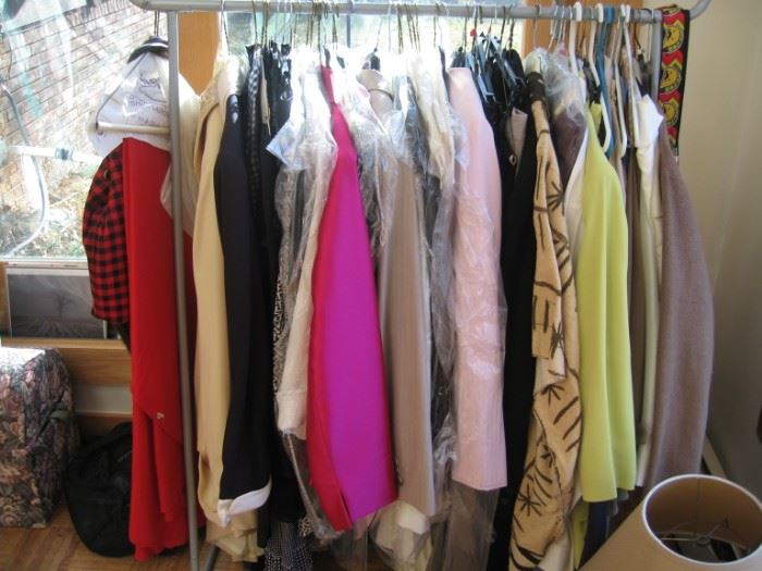 Lot's of woman business clothes, church clothes, and 
 woman's suits.