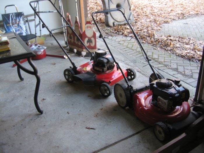 Two lawnmowers.