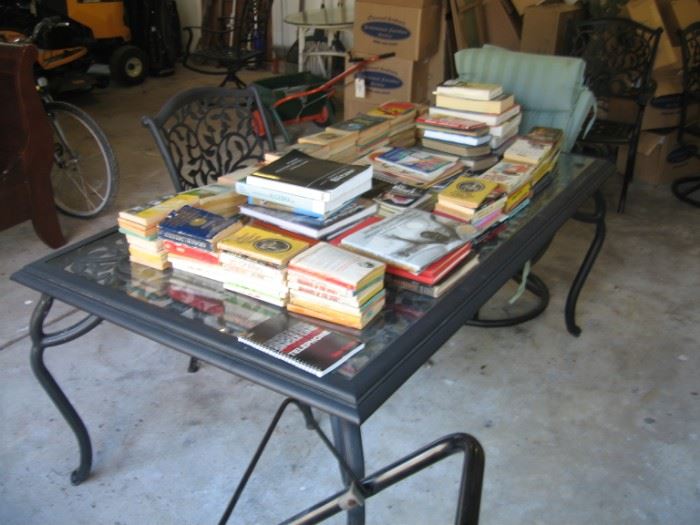 Patio Table with Chairs and books.