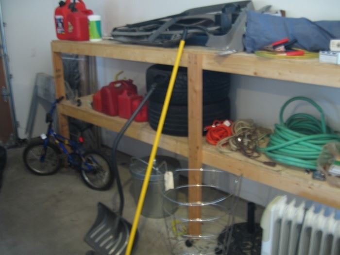 Kids Bike, Gas Cans, Hose, Electric Heater.