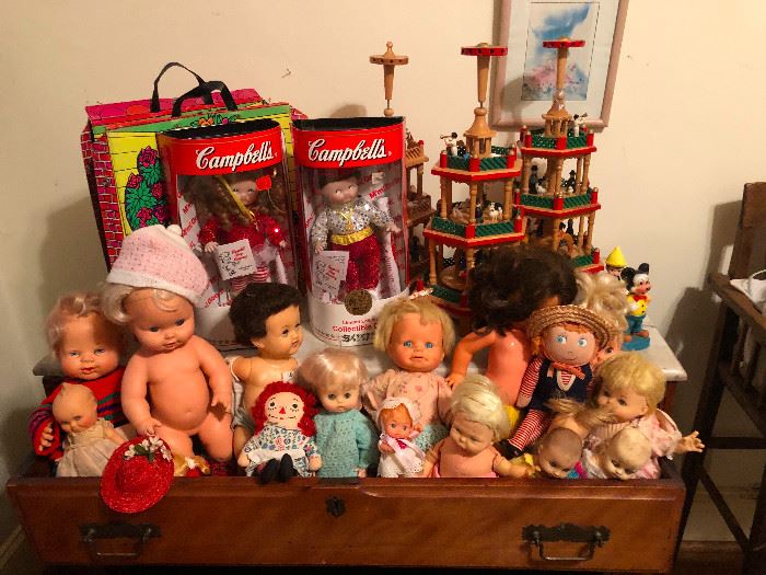 suitcase of baby dolls