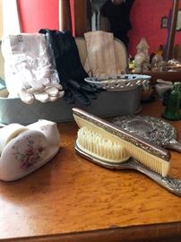 opera gloves, silver brush, comb and mirror set.