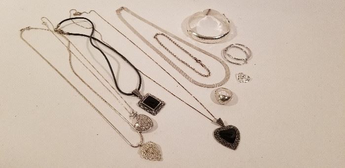 Sterling Silver Pieces including Louis Vuitton https://ctbids.com/#!/description/share/89487