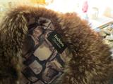Hudson's label in fur jacket.
