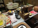 old telephones, bassinet in background