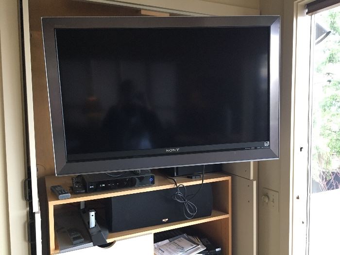 Flat screen, wall mounted TV and electronic equipment