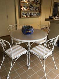 Vintage wrought iron table and chairs, can be used outdoors
