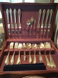 One of two sets of silver plate flatware