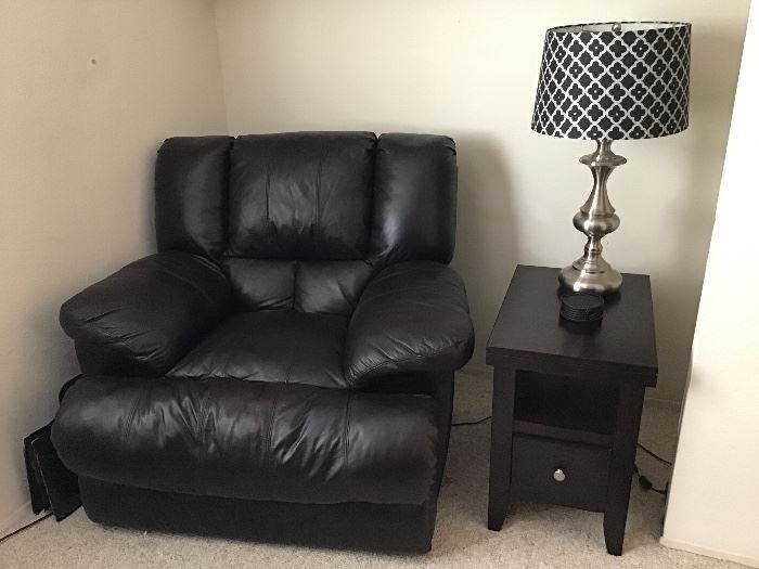 Electric oversized leather wall hugging recliner. Like new! 