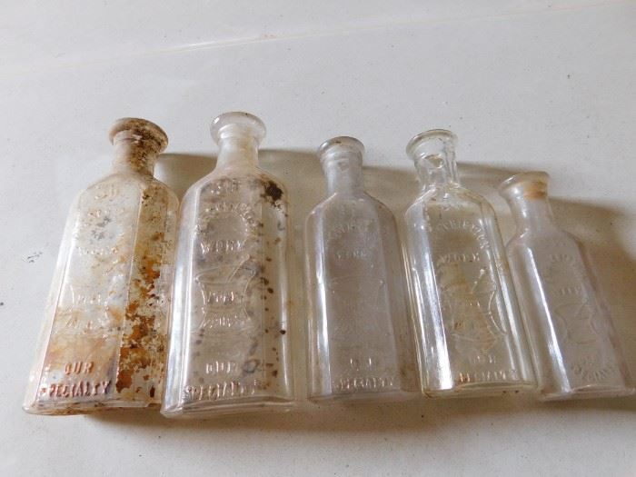Old Embossed Medicine Bottles
