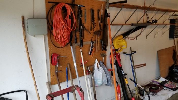 assorted yard and hand tools
