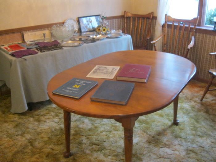 Dining Room Table with Chairs and U of M Books