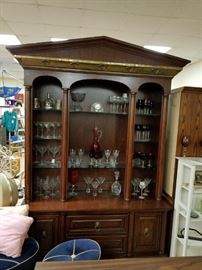 Stunning 2 piece pitched china cabinet & hutch lighted with glass shelves (Imperfections on drawers) Upscale crystal & decor available shown in pictures