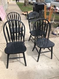 4 matching black painted curved back spindles wooden dining or kitchen chairs