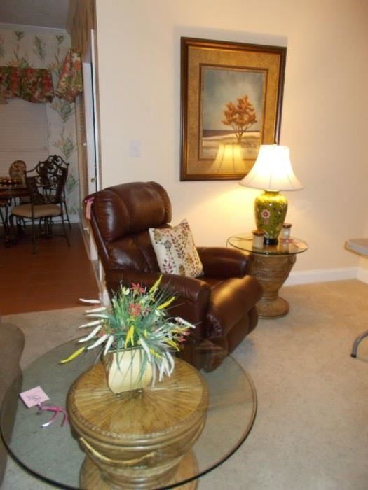 picture, lamps, pillows, recliner, end tables