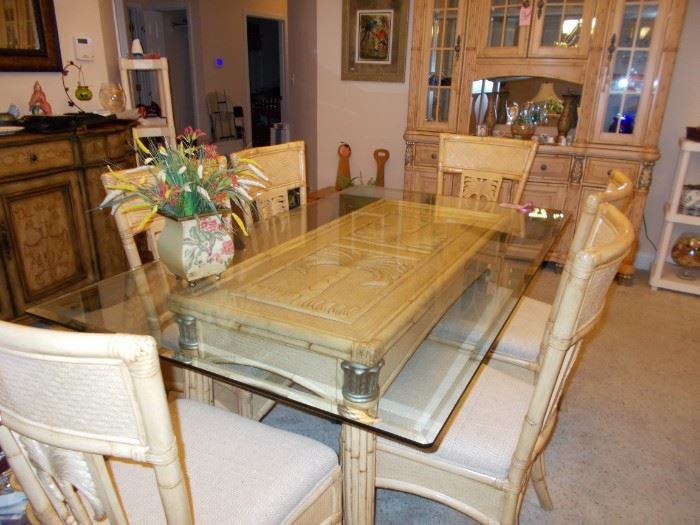 matching table with glass top, carved palms, 6 chairs